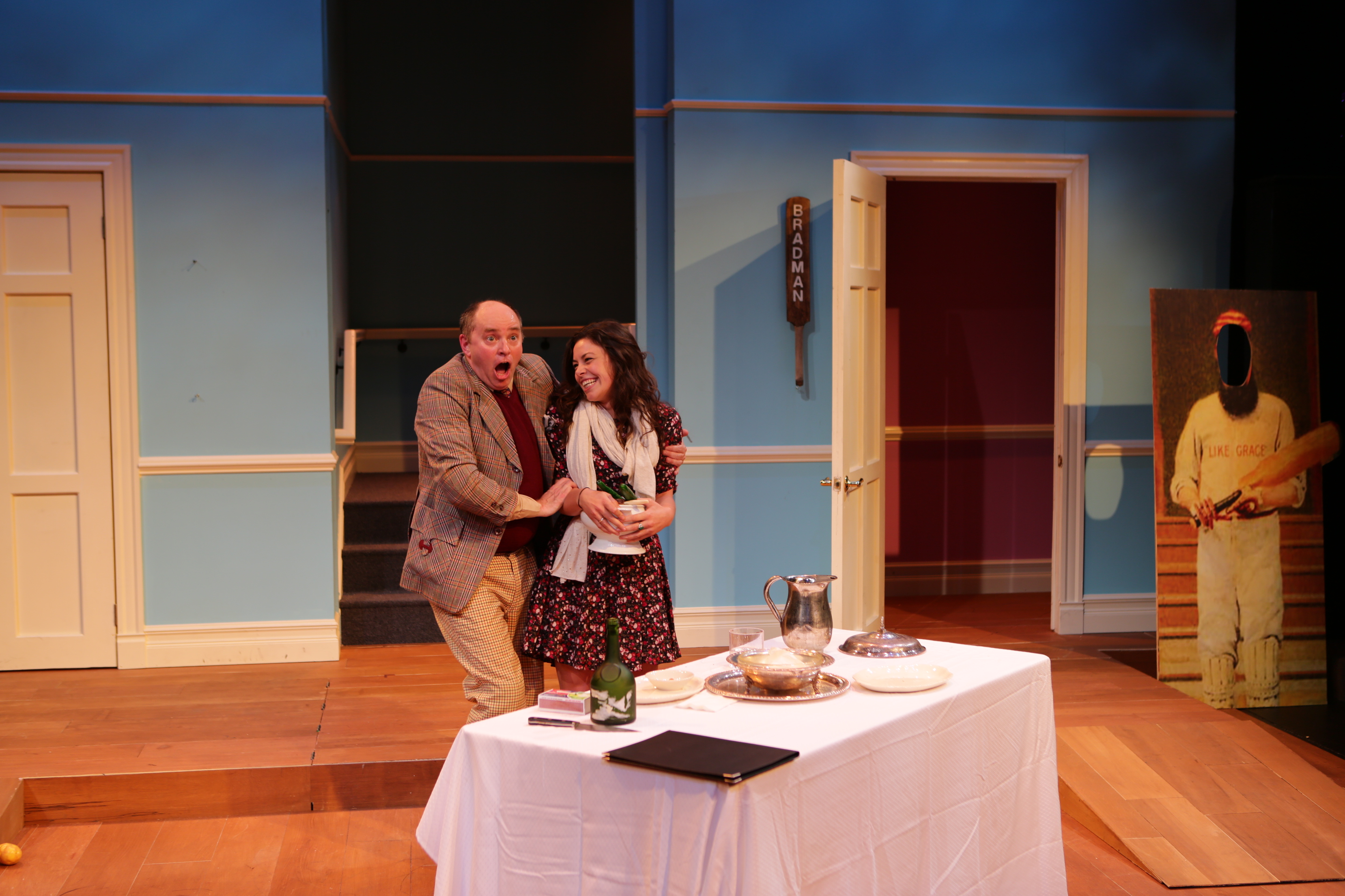 Amanda Spinella as audience plant Christine Patterson and Neil A. Casey as Francis Henshall in The Lyric Stage Company of Boston's One Man, Two Guvnors (2013)