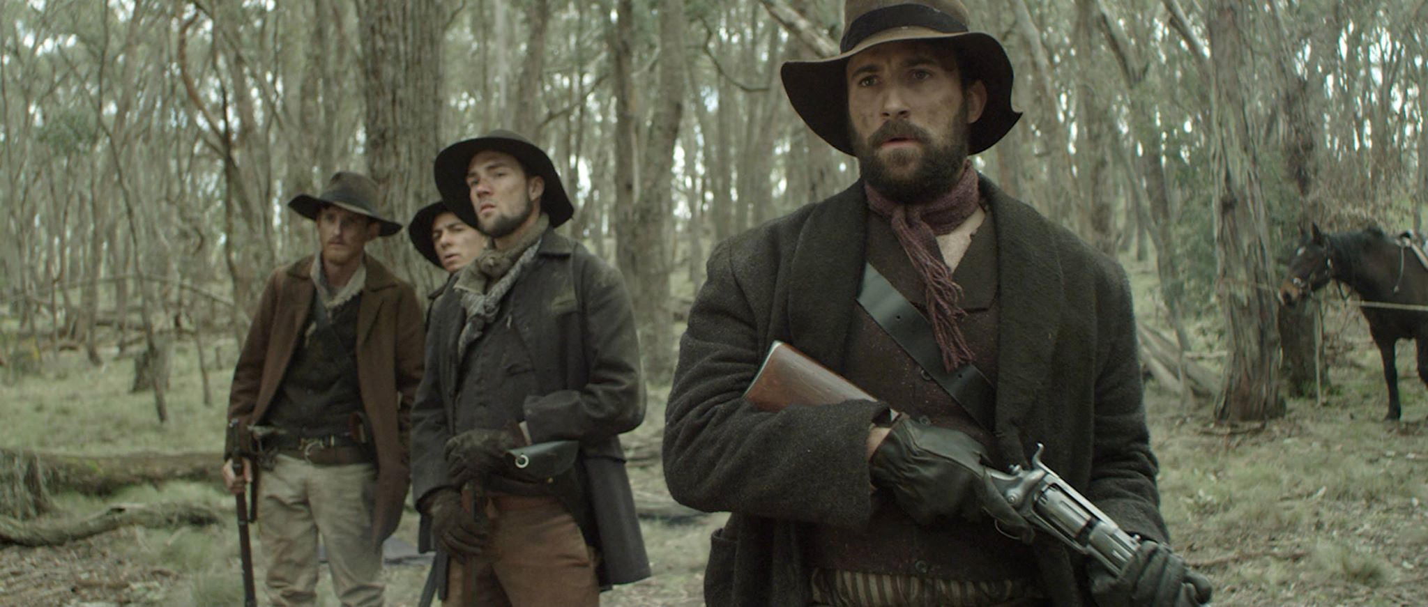 Still from THE LEGEND OF BEN HALL with actors (left to right) Steve Jaeger, Steven Sammut, Nathan Luke and Micheal Resce