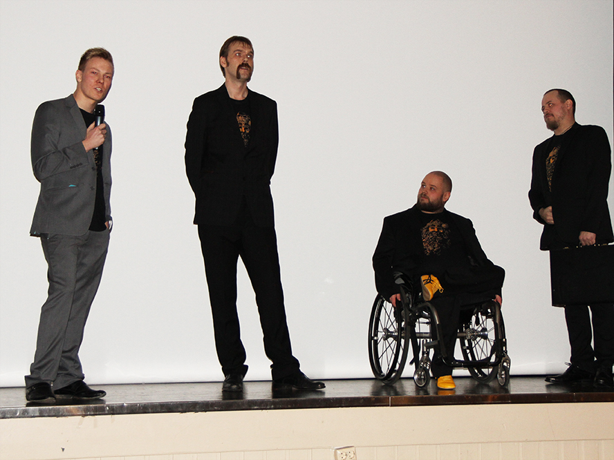 Raymond Volle, Kim Haldorsen, Per-Ingvar Tomren and Magne Steinsvoll on stage before the premiere screening of 
