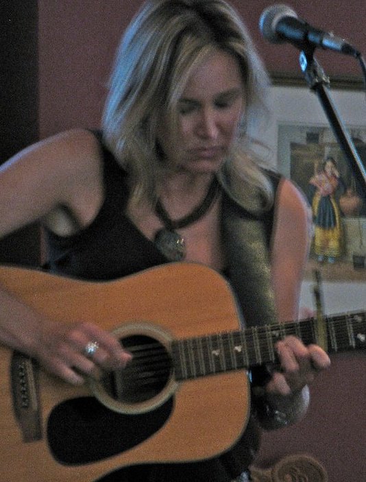 Sharon performing a set of her original songs at the Gamble Roger's Folk Festival, St. Augustine, Florida