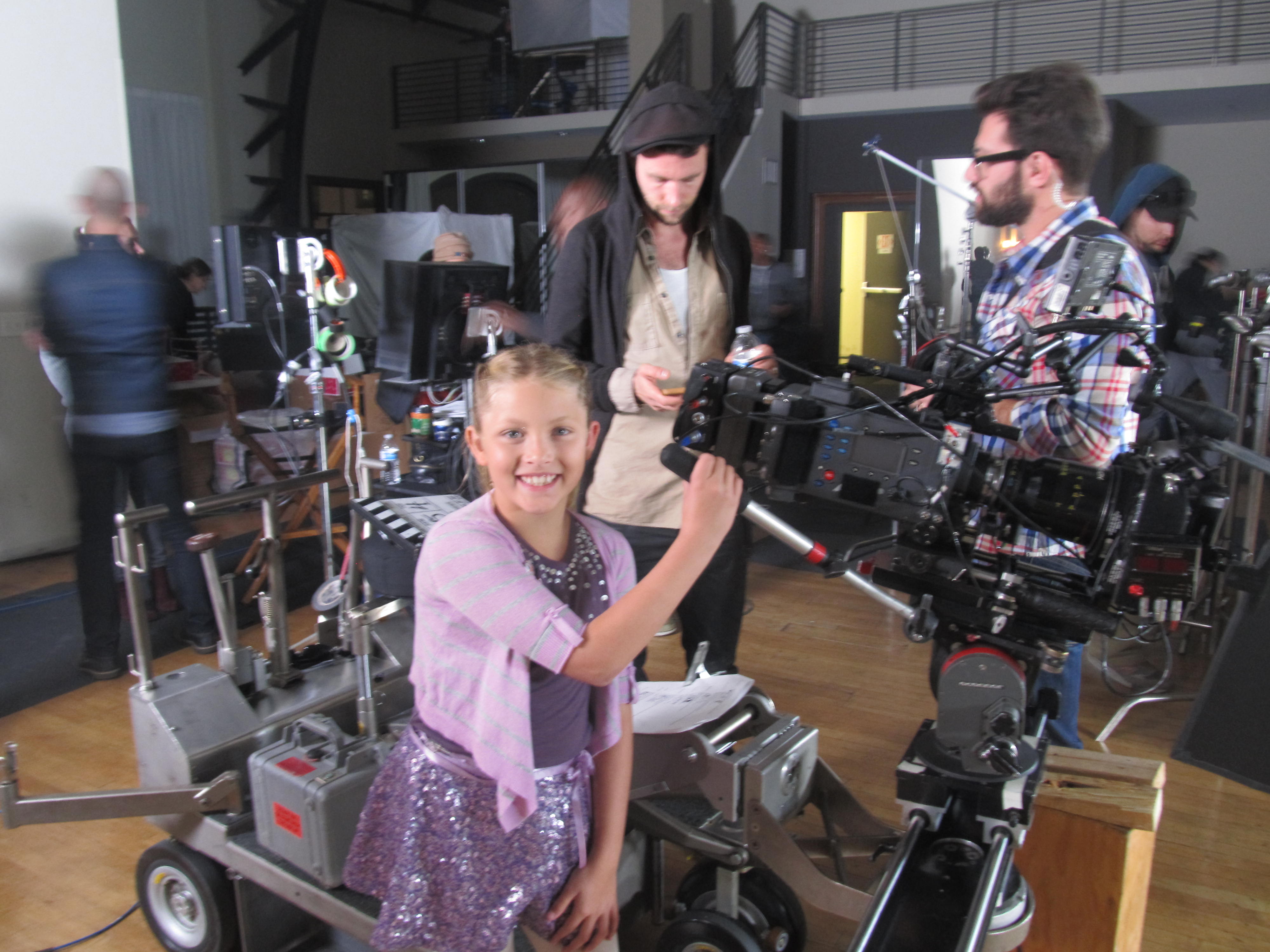Ryan on set checking out the camera after wrapping AMERICAN GIRL - Isabelle, Girl of the Year 2014 doll commercial (Dec. 2013)