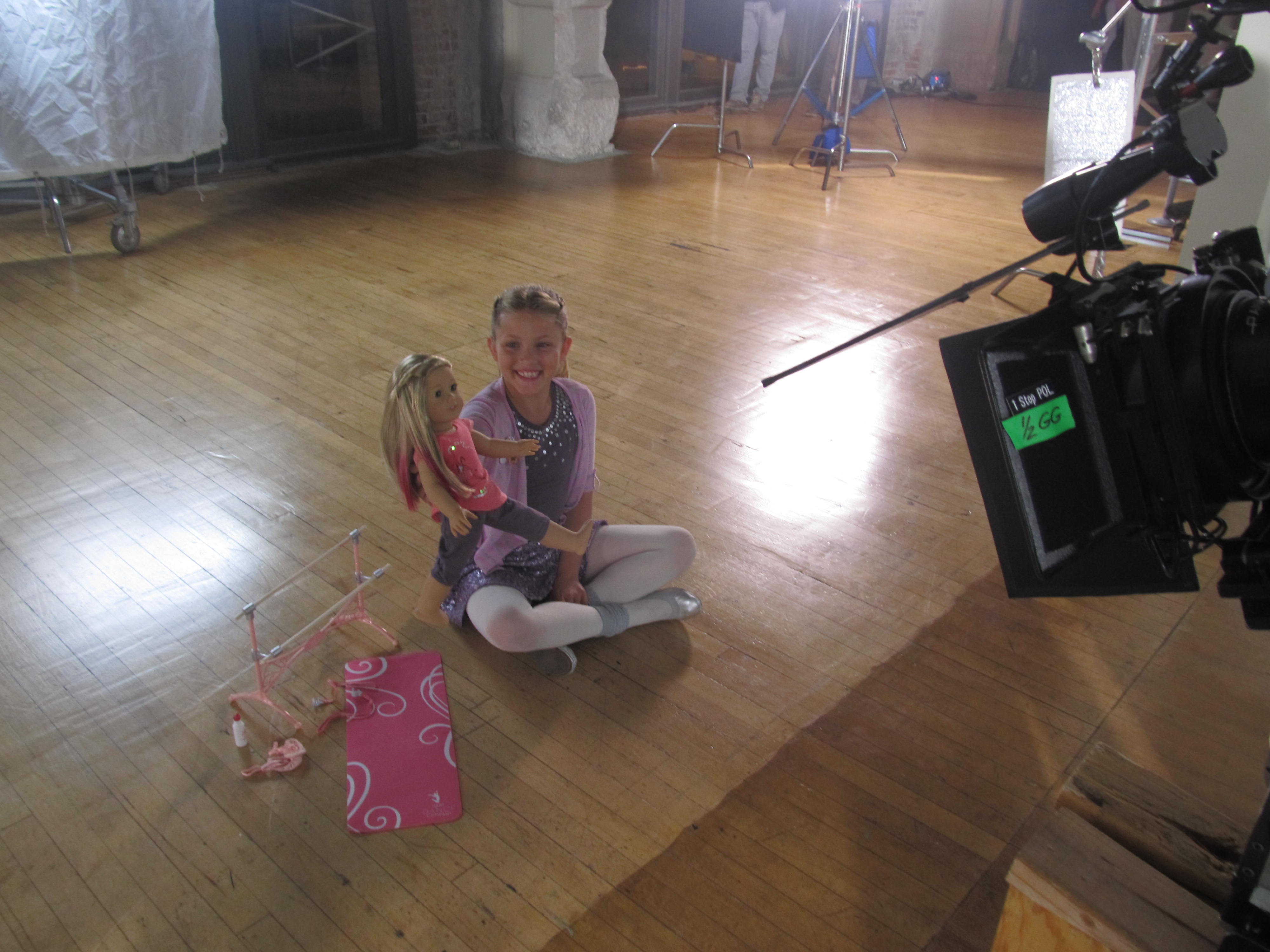 Ryan rehearsing a close-up holding Isabelle at AMERICAN GIRL - Isabelle, Girl of the Year 2014 doll commercial (Dec. 2013).