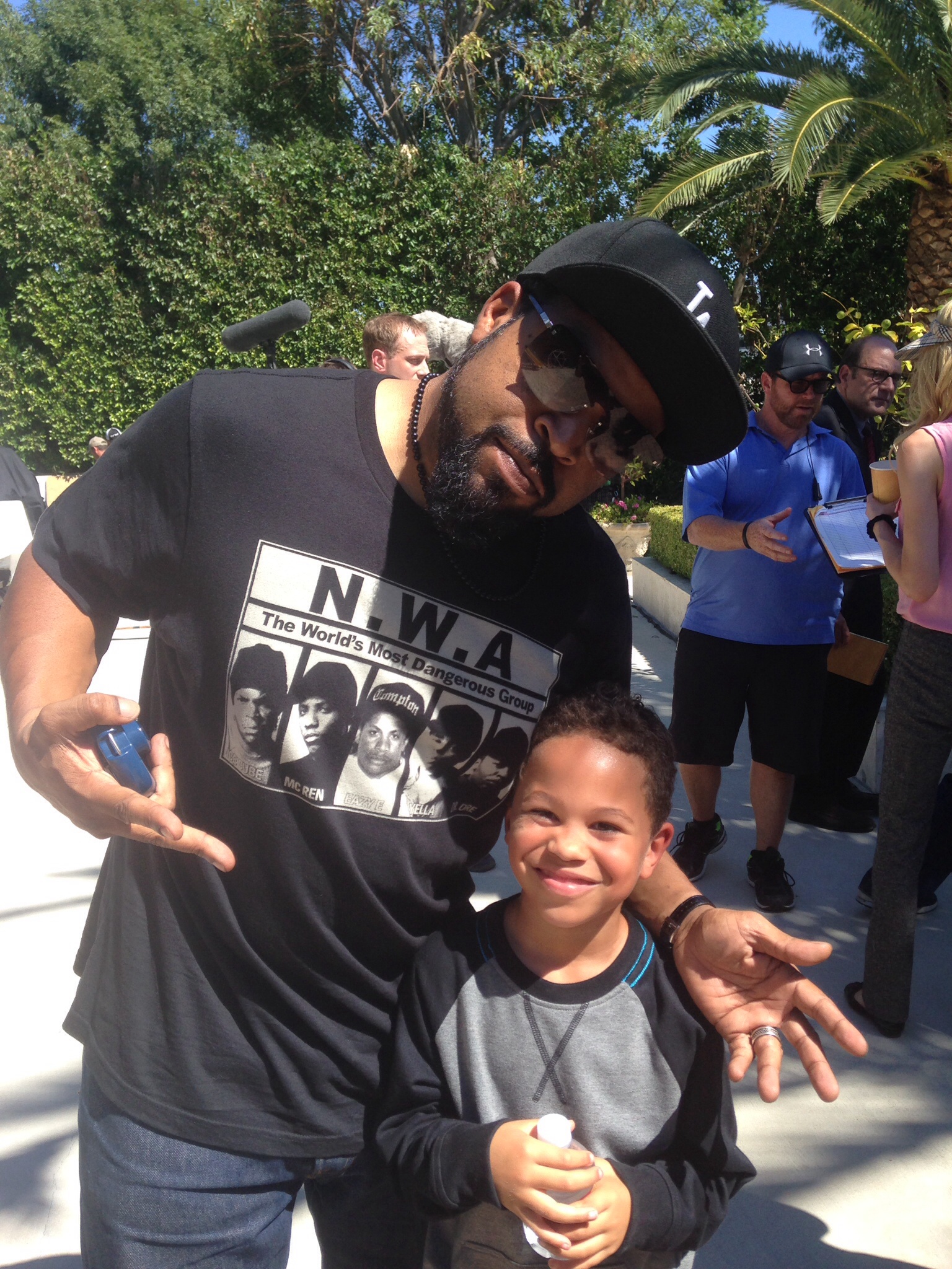 Sage and Ice Cube on set.