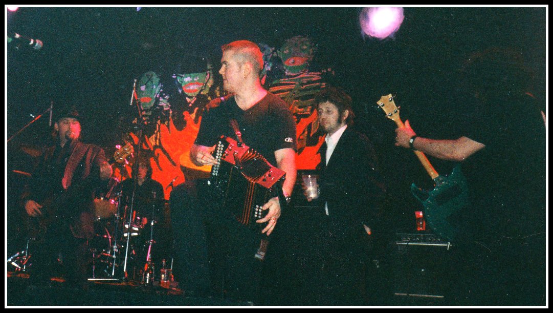 Andy when he played with Shane MacGowan and The Popes - The Mean Fiddler, London -1999