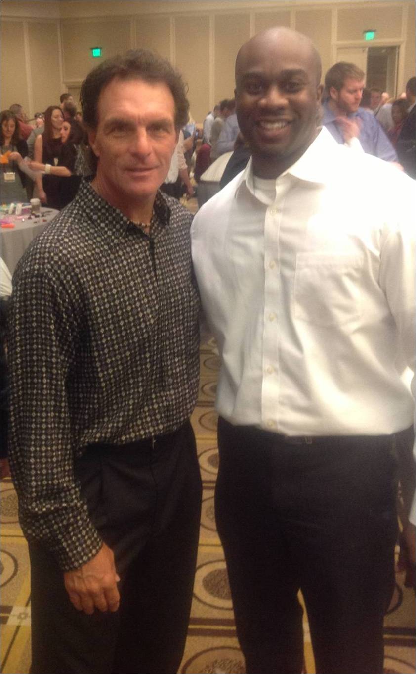 Canadian actor Michael A. Amos with former New England Patriot, Toronto Argonaunt, and Heisman Trophy winning quarterback, Doug Flutie. Both were in attendance for a 'Bike build/Giving back to the community' event for the Boys and Girls Club in Boston, MA.