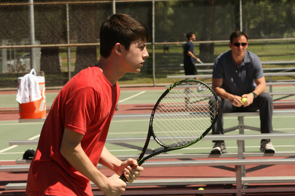 Still of Jason Isaacs and Dylan Minnette in Awake (2012)