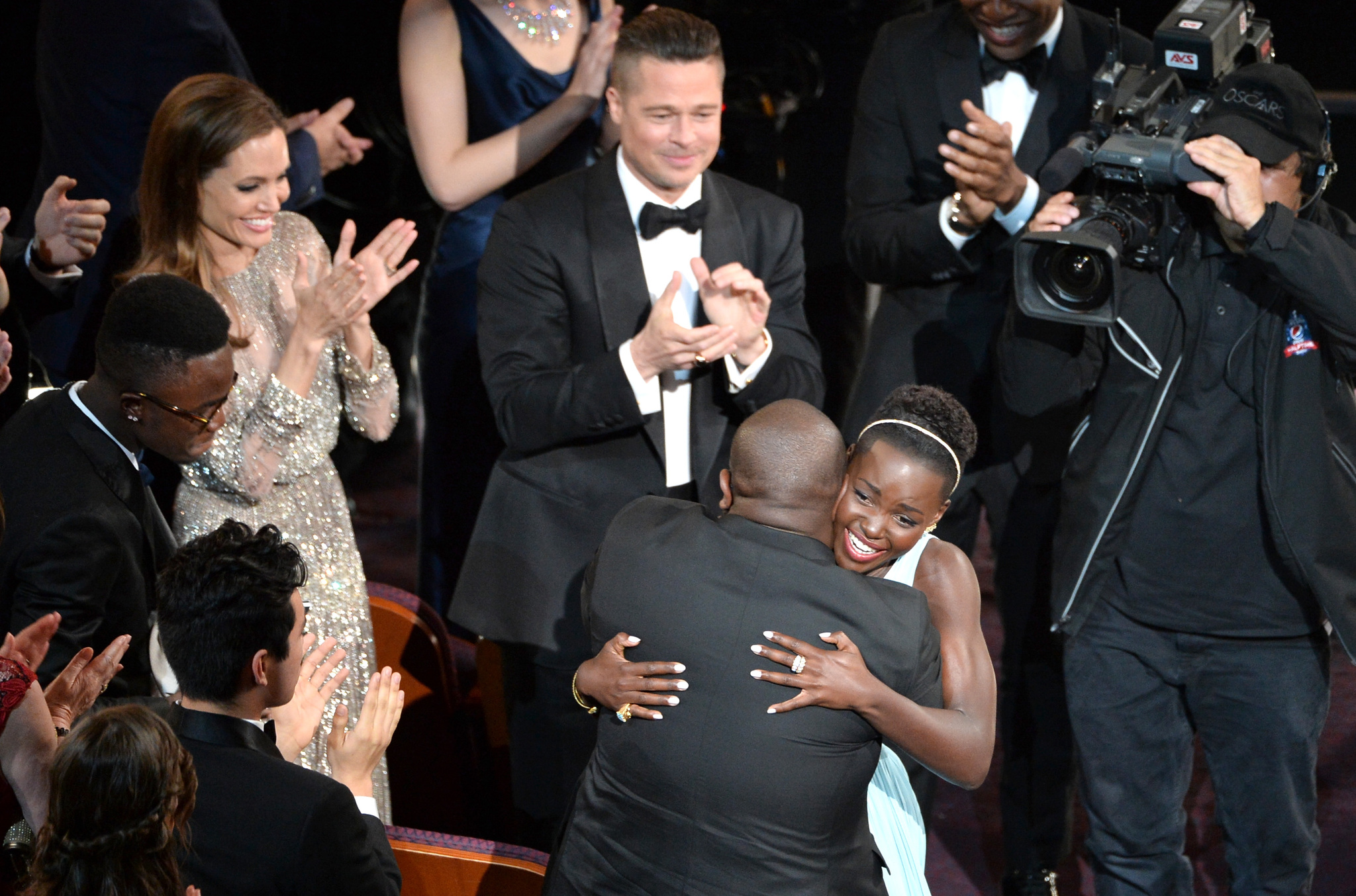 Brad Pitt, Angelina Jolie, Lupita Nyong'o and Steve McQueen at event of The Oscars (2014)