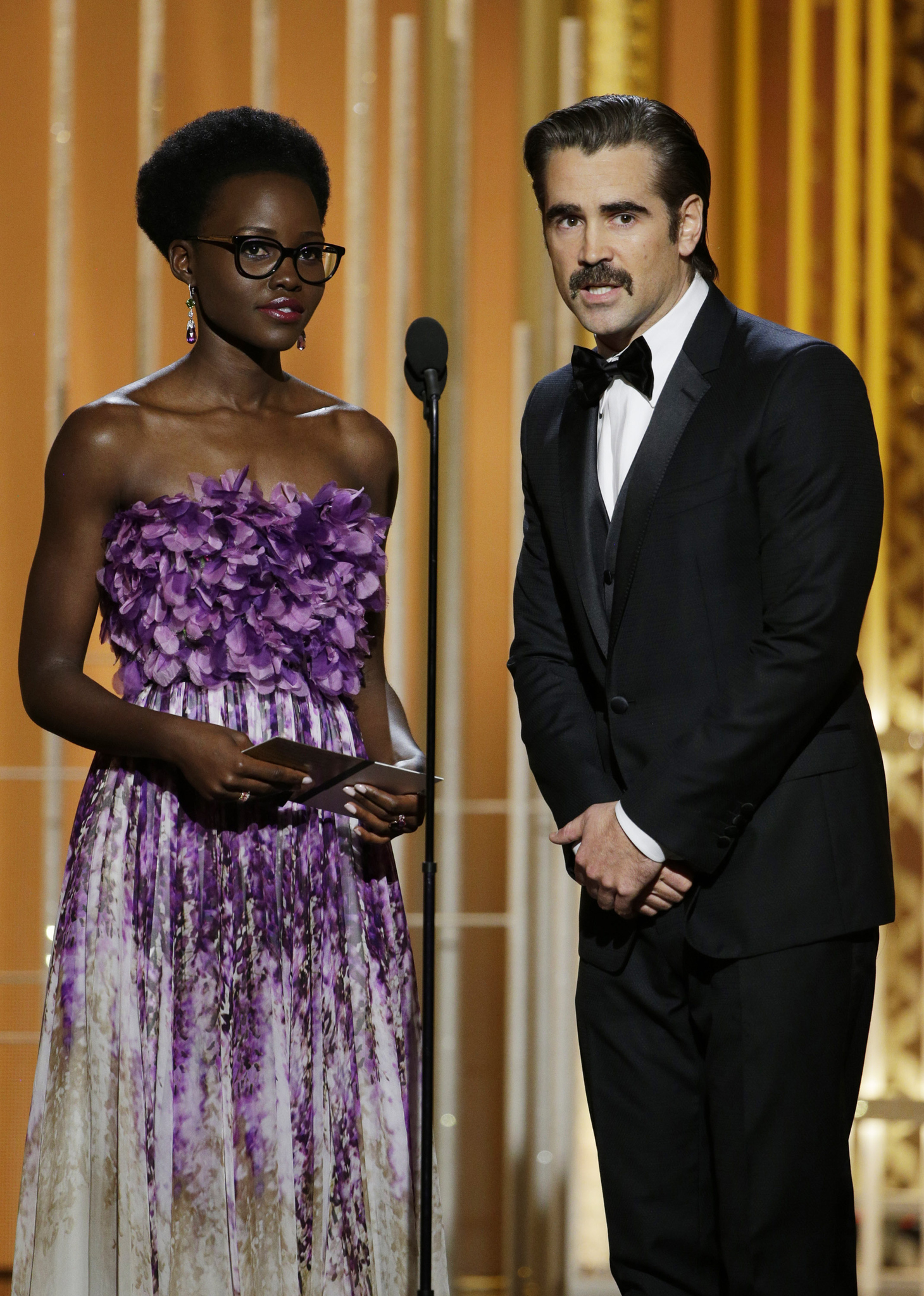 Colin Farrell and Lupita Nyong'o at event of 72nd Golden Globe Awards (2015)