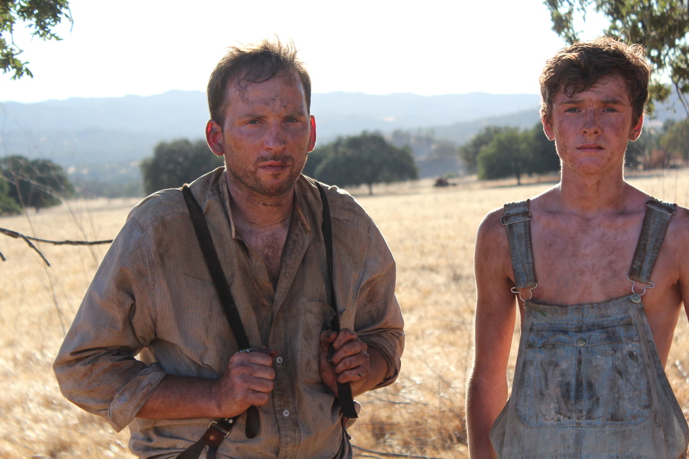 Ron Hanks (left) as Gator and Justin Hall as Cotton in the film Dirt Eaters