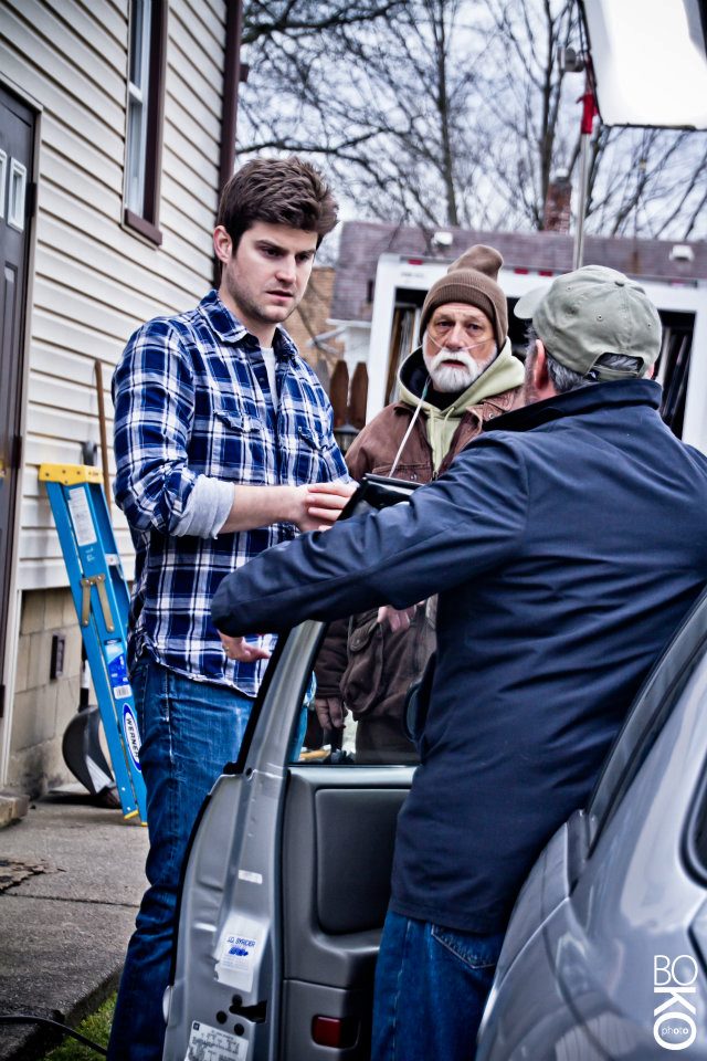 Director Ryan Moody with actors Steve Larkin and Jack Kehler on the set of 