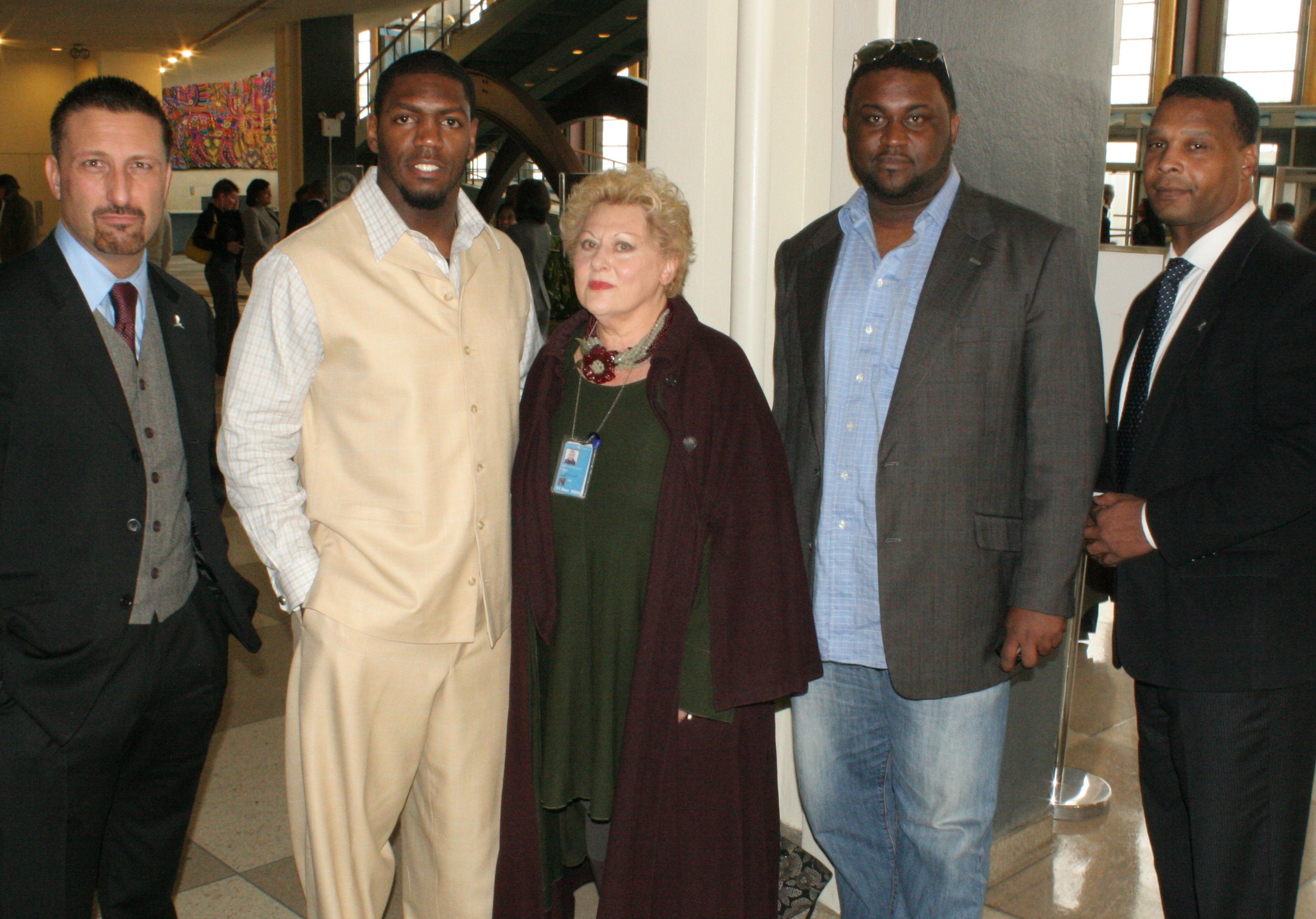 Adam DiSpirito, Jonathan Vilma, Greg Delbeau, and Freeman Mcneil of the New York Jets attend the Child Soldiers exhibition at the United Nations Building, NYC. USA