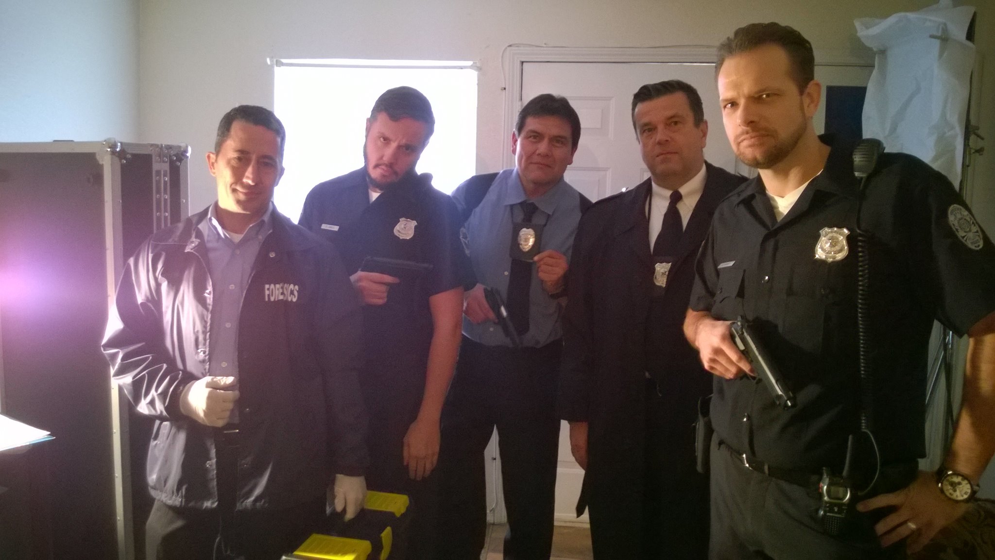 Matt Thornton and the police officers/detectives for Sudden Reality movie.