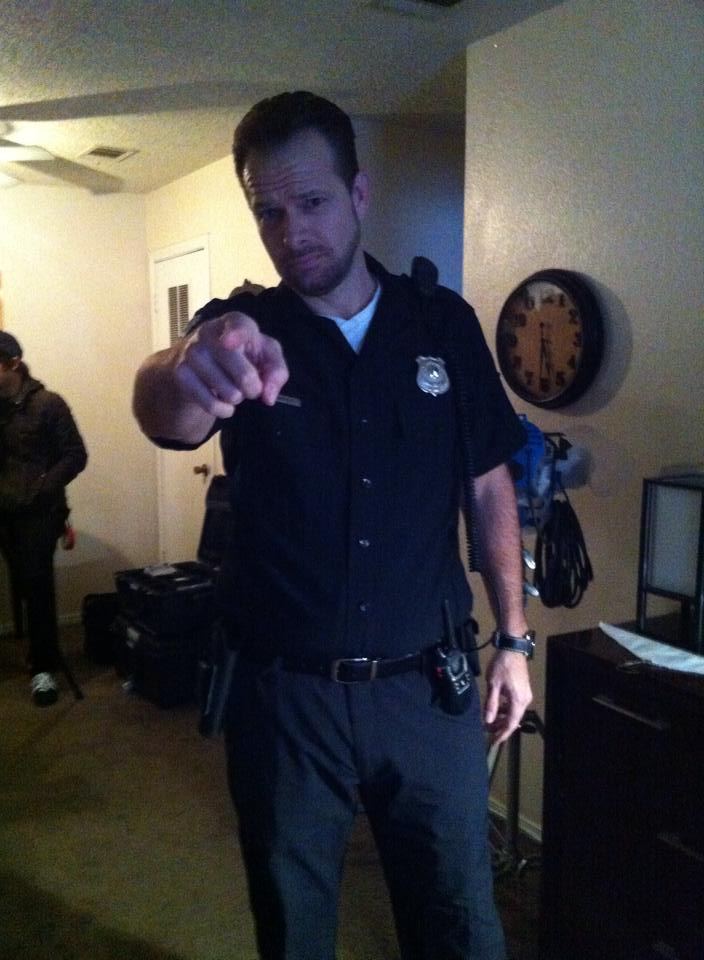 Matt Thornton Police Officer 1 in costume on set of Sudden Reality.