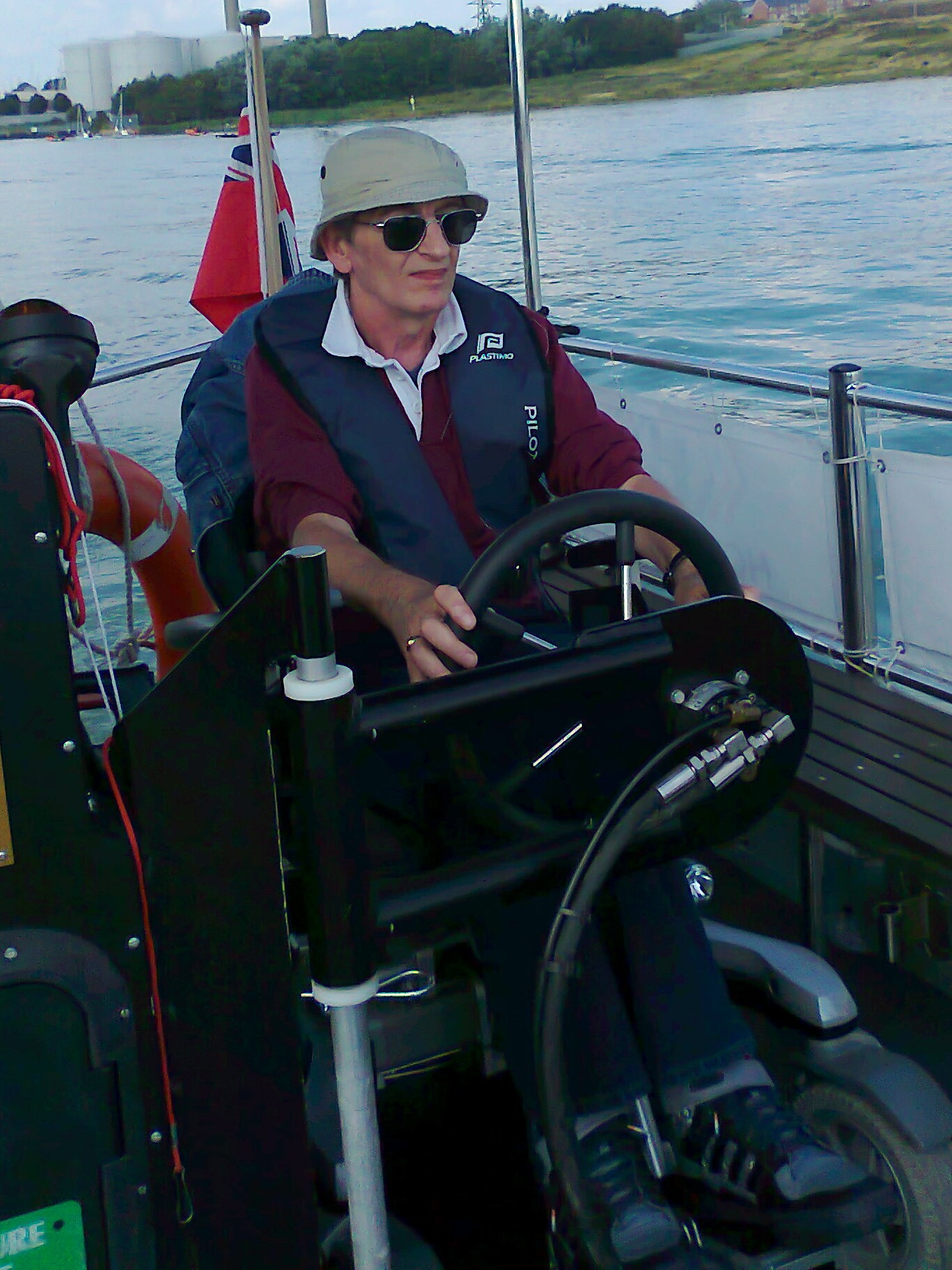 At the helm of a Motorboat, Cowes, Isle of White
