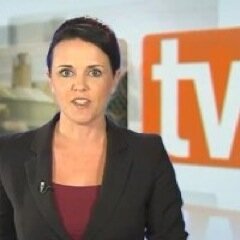 Krystyna Pollard hosting TVS News, 2013.