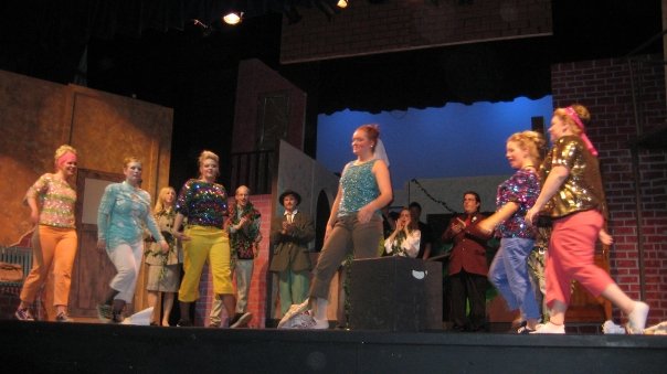 On stage during The Little Shop of Horrors.