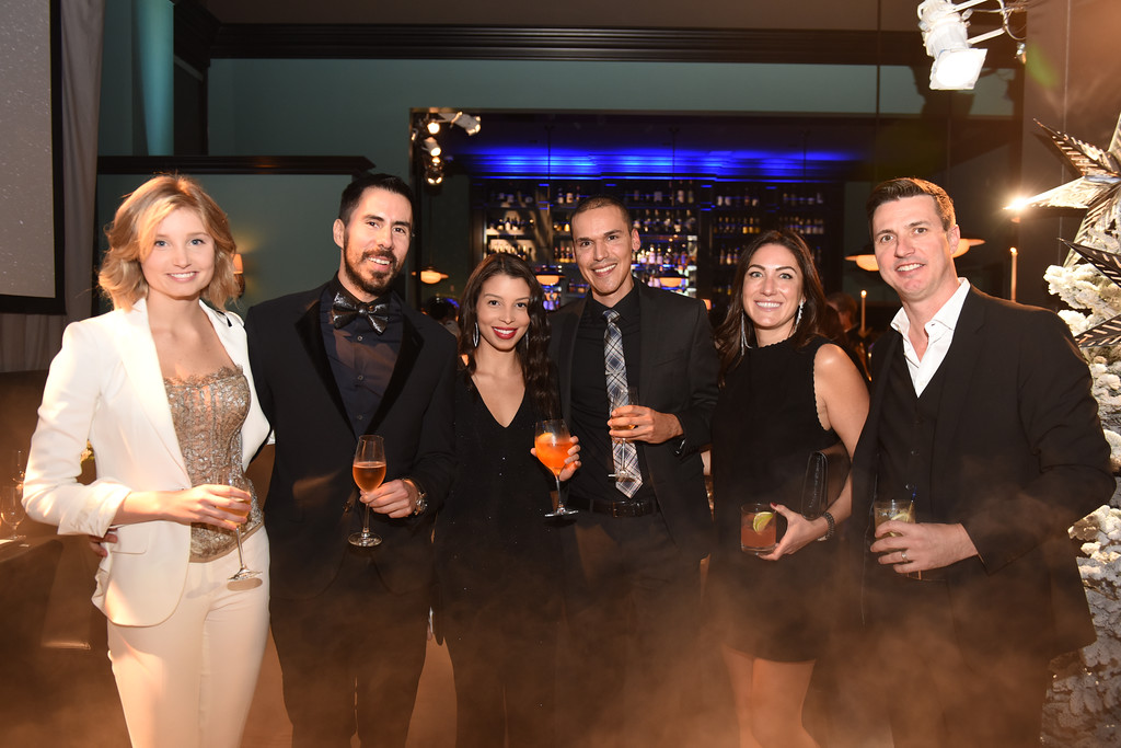 Cooney with staff and CEO Gabriel Hammond of Broadgreen Pictures at the company's 2015 Holiday Party