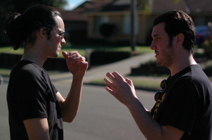 Luke McKay (l) directs actor Tashi Martel in 'Hit and Run'.