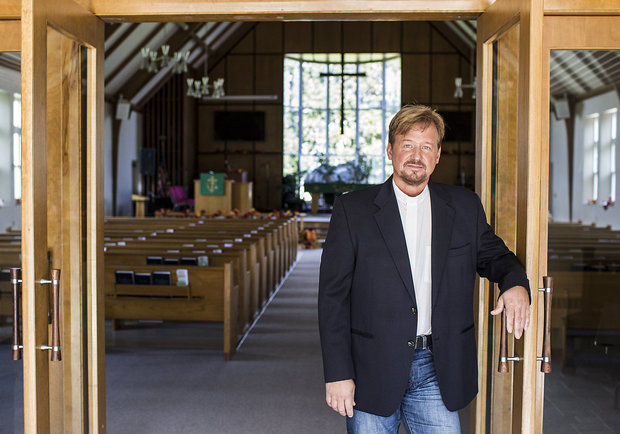 The Rev. Frank Schaefer in his sanctuary at Zion United Methodist Church of Iona in Lebanon county. He could lose his ordination credentials after he performed his son's same-sex wedding.