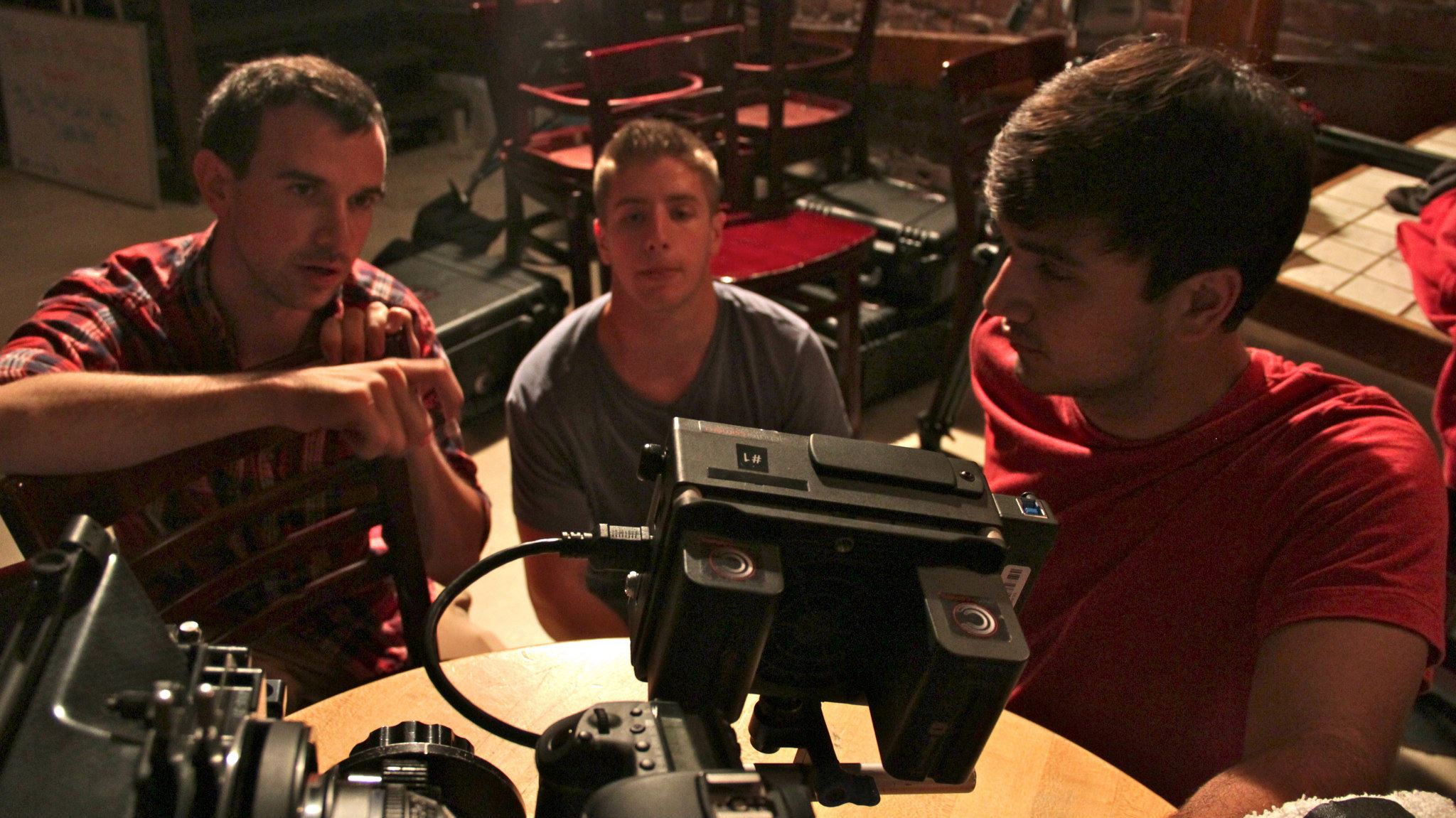 Ilan Benjamin looking over footage with his DP Jack Martin and 1st AC Arjan Sudick for Poets