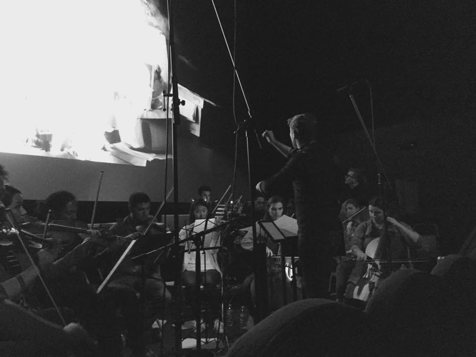 Conducting the Dead Metaphors score live to picture at arcovertLA. December 5, 2014, Downtown Independent Theater.