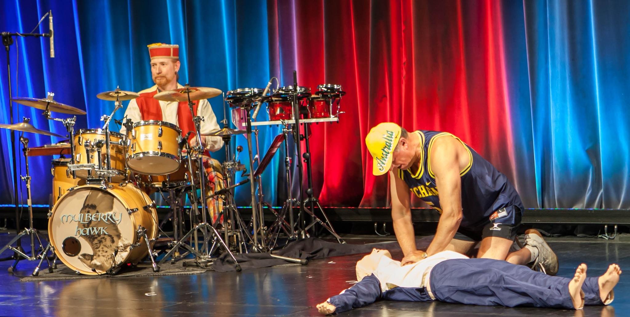 Performing CPR during the Paris show of The Legend of L'Inconnue