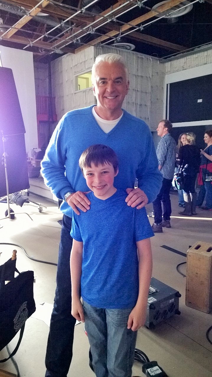 Reid on set with John O'Hurley