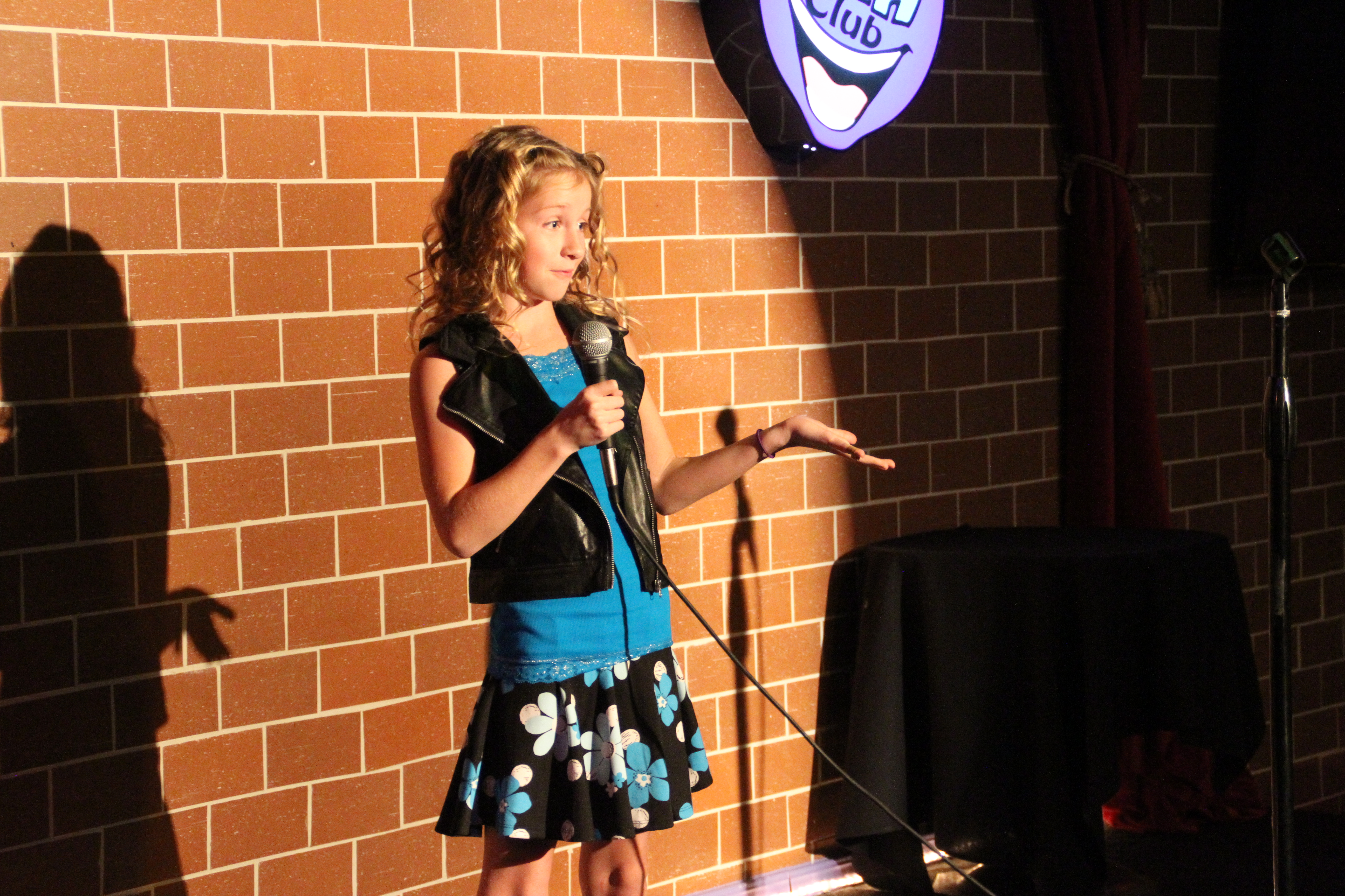 Jolie performing stand up comedy at the HaHa Cafe in North Hollywood