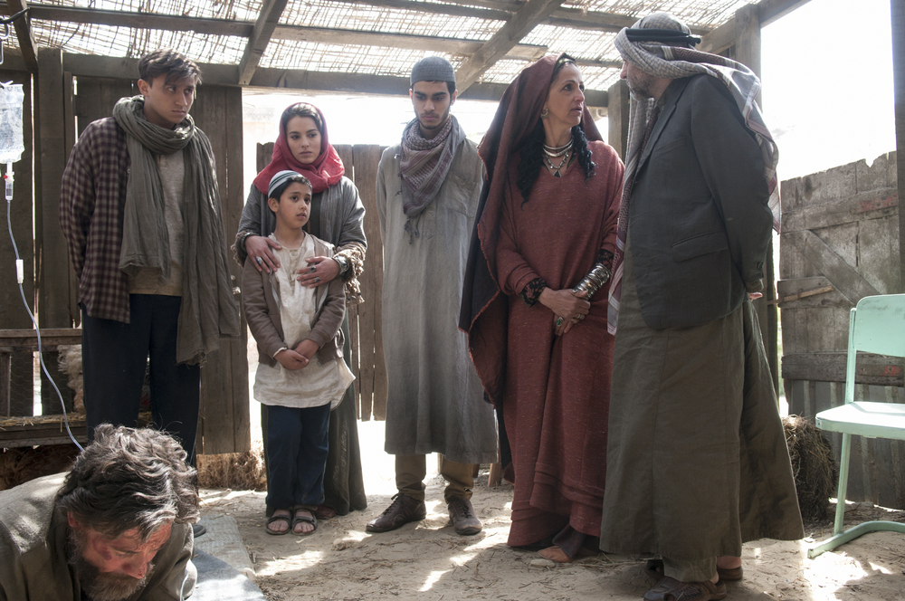 Still of Nasser Memarzia, Melia Kreiling, Nathan Clarke and Armin Karima in Tyrant (2014)