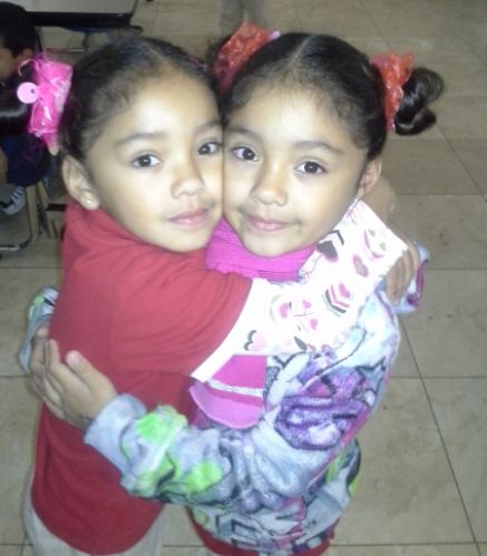 Nalena & Lavena hugging at school