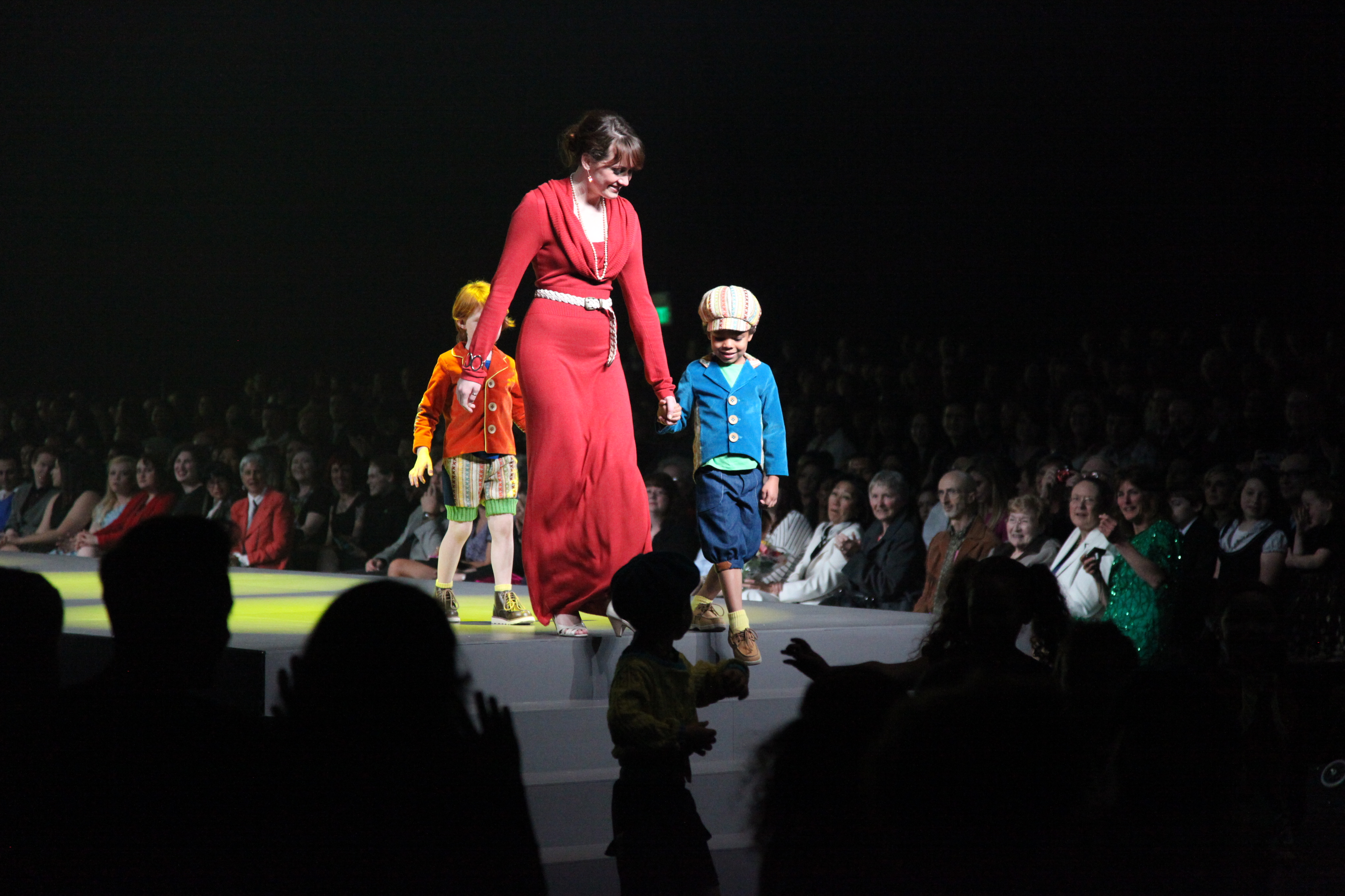 Aidan being a gentleman as he walks the designer down the stairs at FIDM's DEBUT 2013.