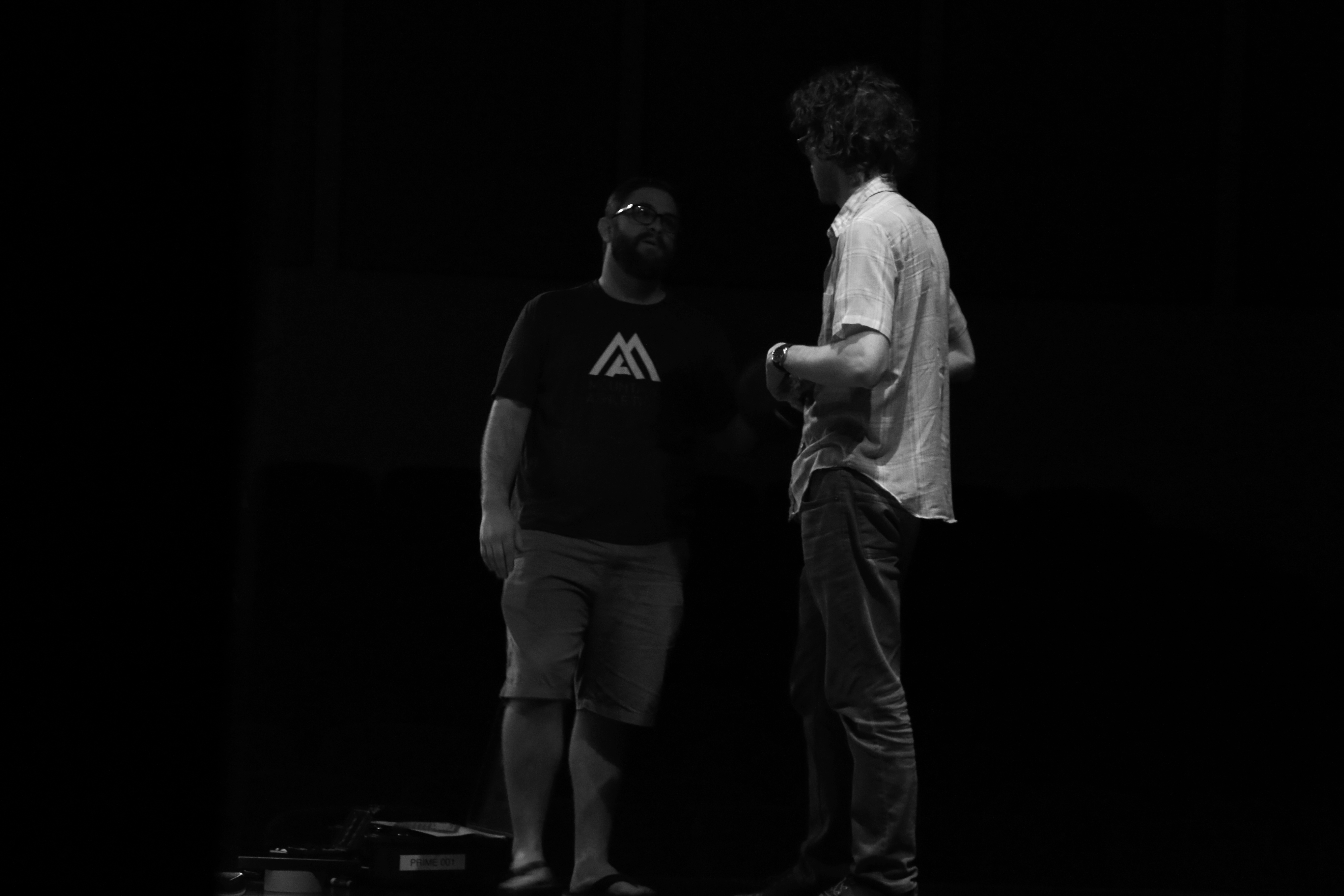 Writers Johnathan Paul and David Goodman discuss scenes during production of The Great Hanging.