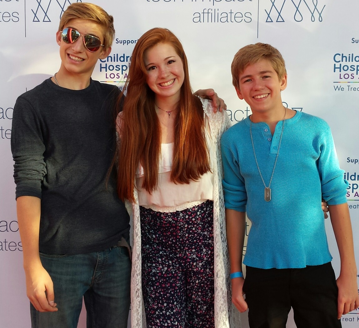 On the red carpet at the Teen Impact Affiliates(2014) charity at the Los Angeles Sports Museum with Nicki Kelly and Jack Dean.