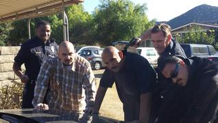 Joseph Wilson playing an LAPD Officer and Noel Gugliemi playing 