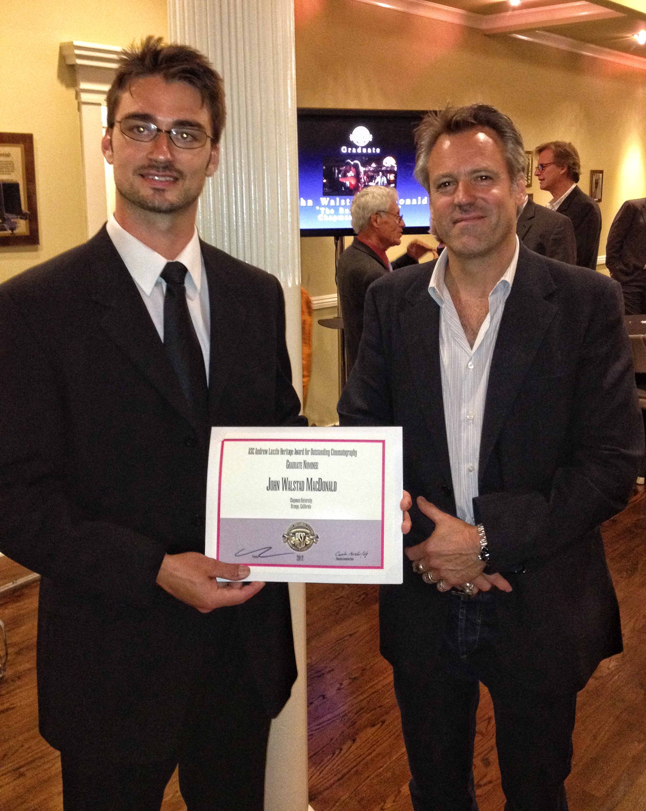 John W. MacDonald receiving an American Society of Cinematographers award nomination, with Wally Pfister