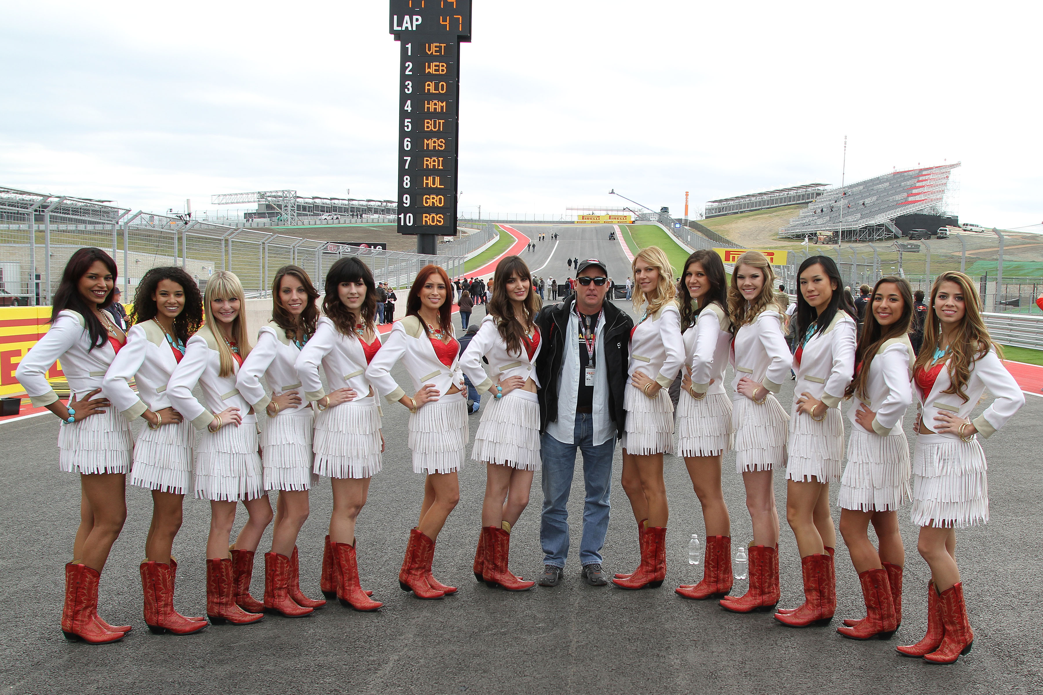 On the Starting Grid with the COTA Girls at United States F1 Grand Prix at the Circuit of the Americas. Austin, Texas 2012.