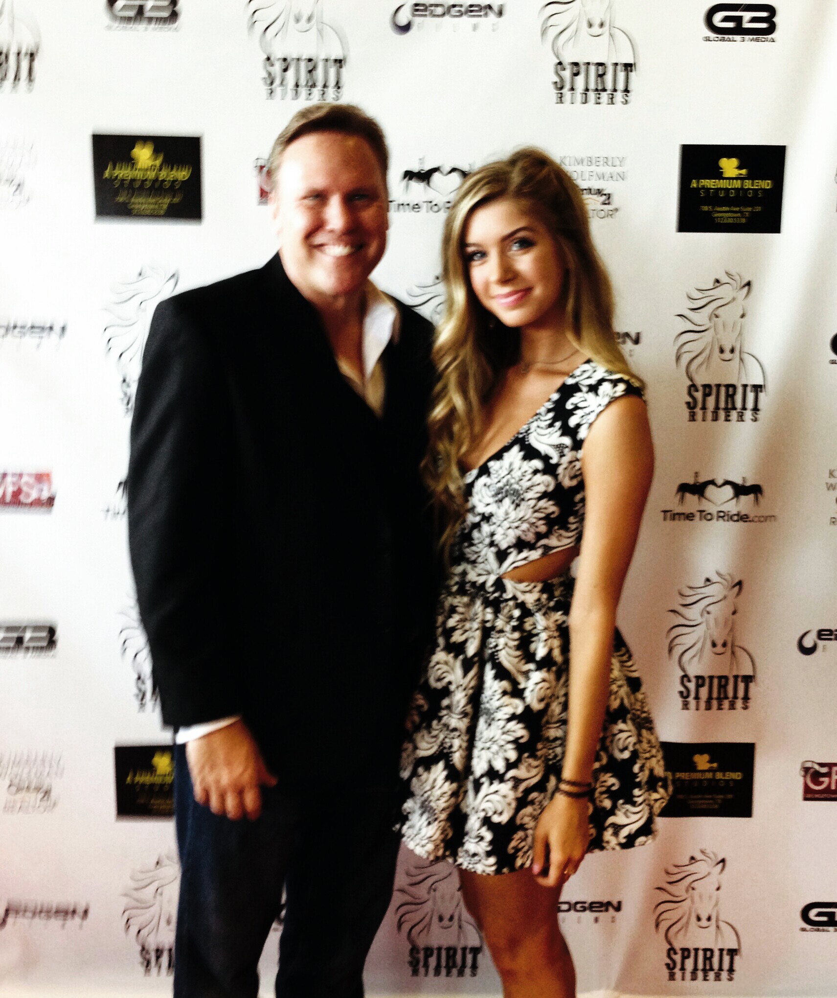 Carlton Caudle on the red Carpet with actress Allie DeBerry at the premiere of'Spirit Riders'.
