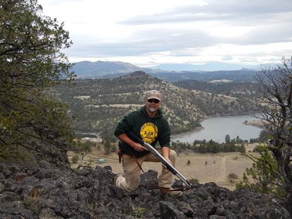 Capt. Bill on ridge overlooking the family ranch below