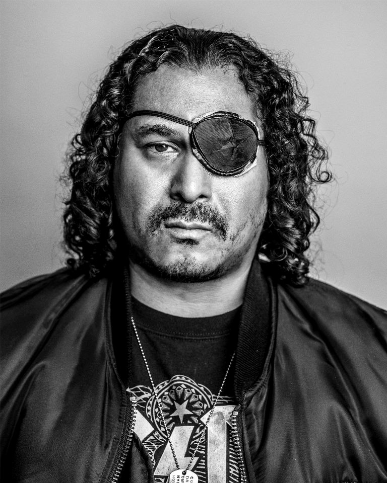 A Black & White still in character as a biker that was part of Ray Katchatorian's photography show 'Captured' which exhibited at the Arclight Hollywood.