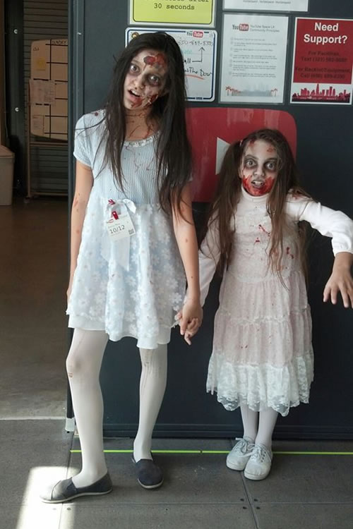 Gracie with sister Emily Rey on set of zombie movie.