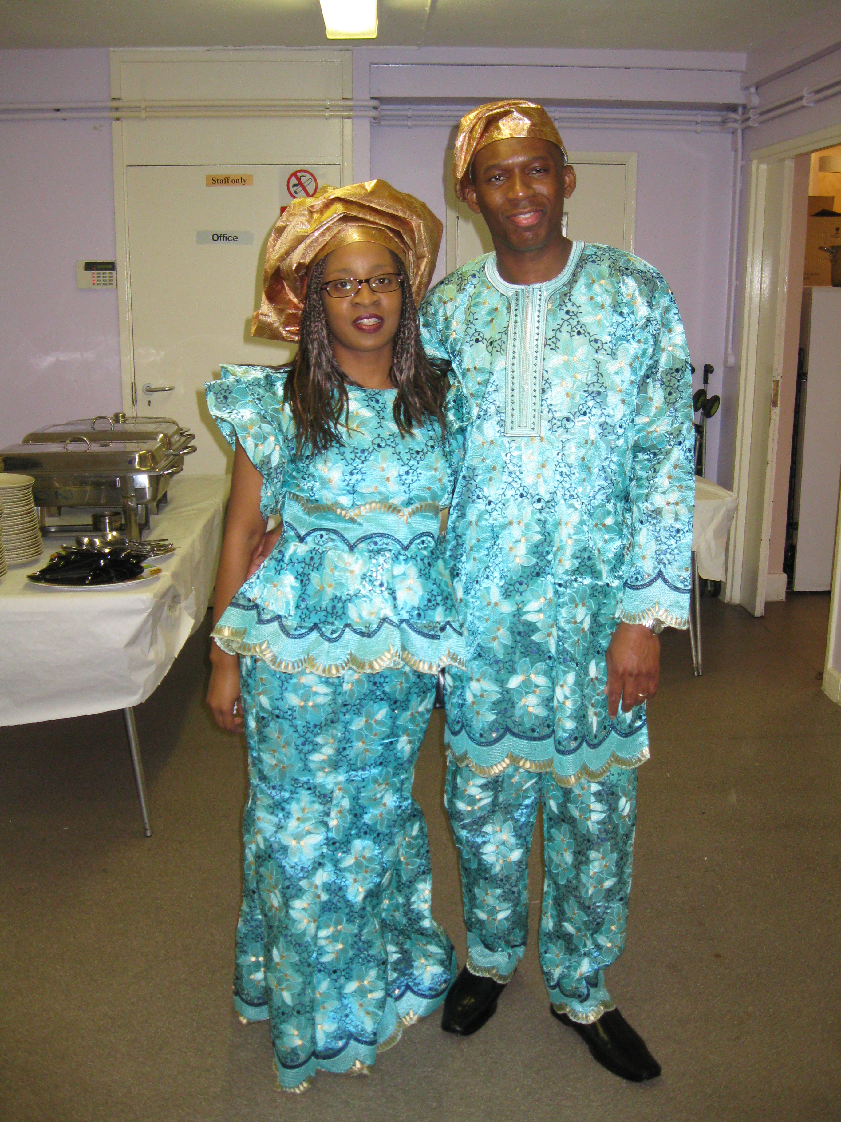 Actor David Olawale Ayinde and his wife Patricia Ngozi Ayinde, dressed in African Attire, at a Social Event