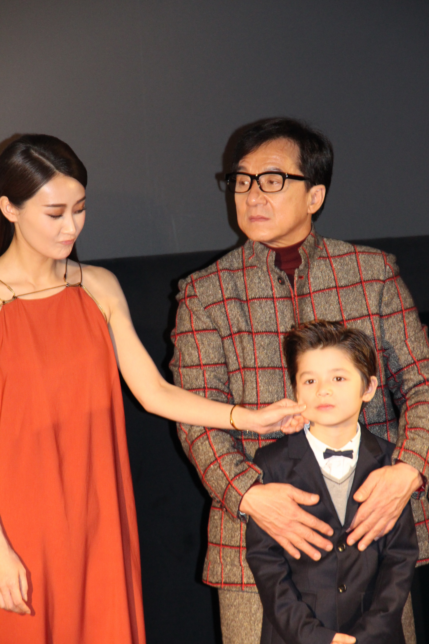 Lin Peng & Jackie Chan play with Jozef Waite in Beijing, China at the Dragon Blade premiere. February 2015.