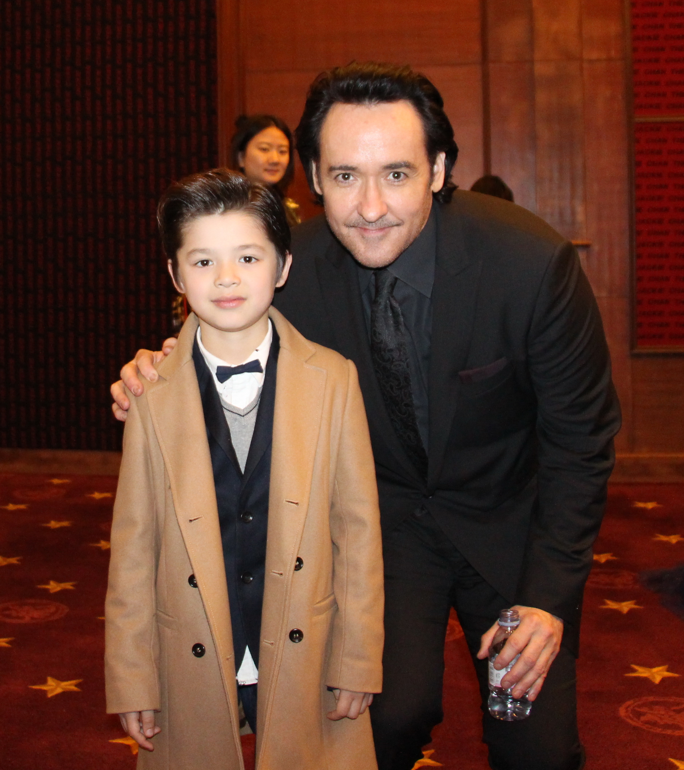 John Cusack with Jozef Waite in Beijing, China for the Dragon Blade premiere.