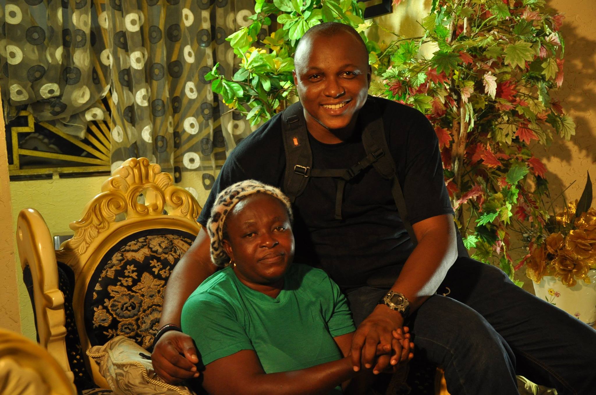 Stanlee Ohikhuare on set shooting a Documentary on Archbishop Benson Andrew Idahosa. Pictured here with Inuwata; who was raised from the dead as a little child - by Benson Idahosa.