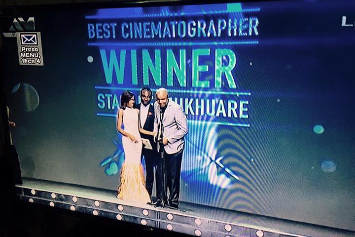 Screen Grab of Stanlee Ohikhuare receiving his Award for Best Cinematographer at the 2015 AMVCA