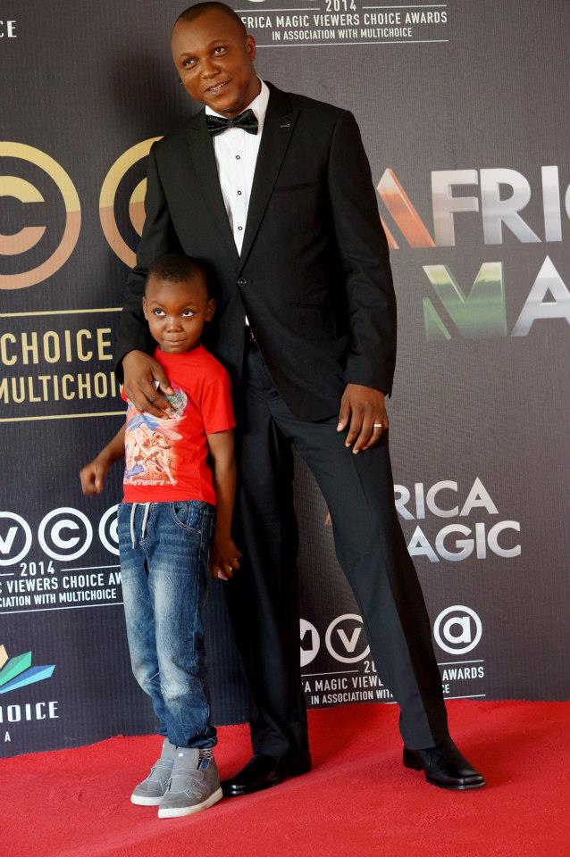 Stanlee Ohikhuare and his son David on the Red Carpet of the 2014 AMVCA