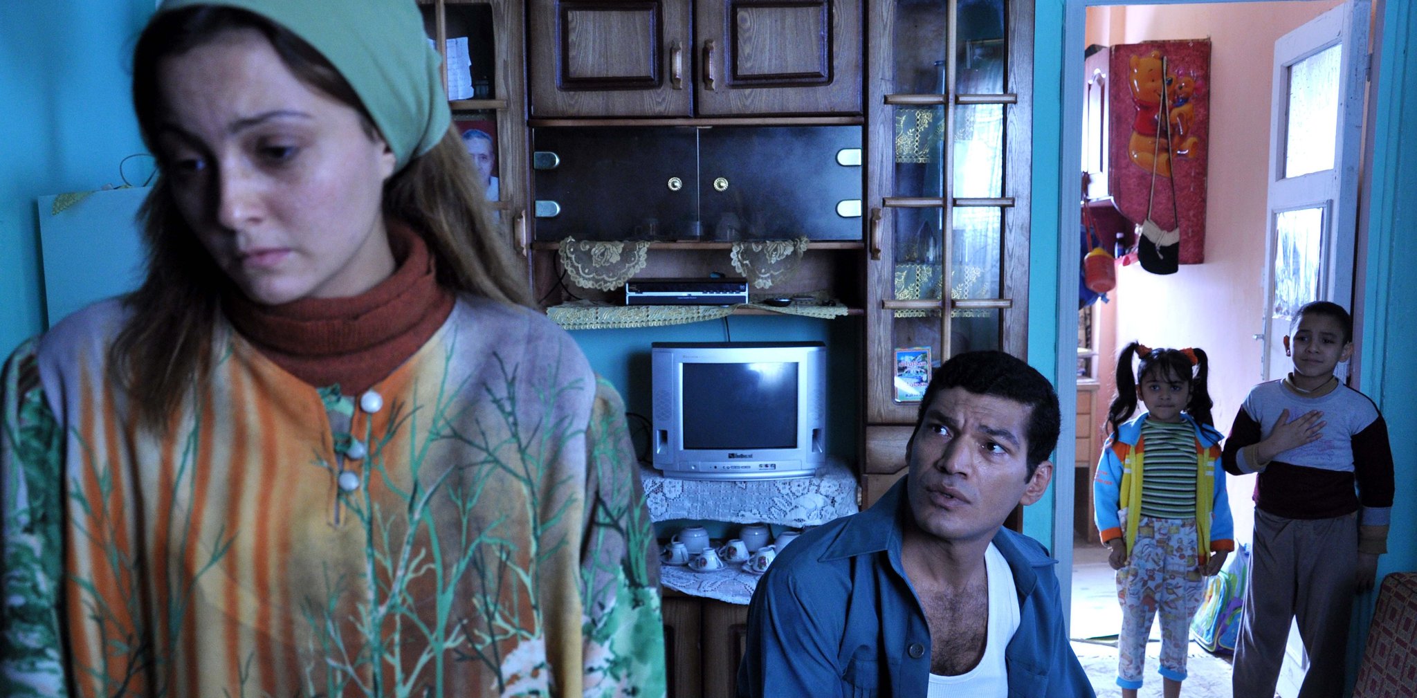 Still of Bassem Samra and Bushra in 678 (2010)