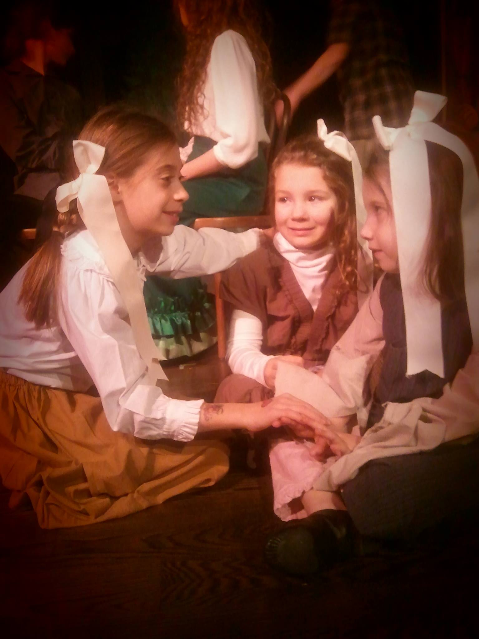 Rowan on stage with her fellow Scrooge cast members