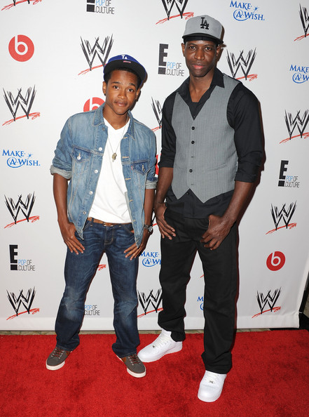 Octavius J. Johnson with Kwame Patterson on carpet of Superstars for Hope Event