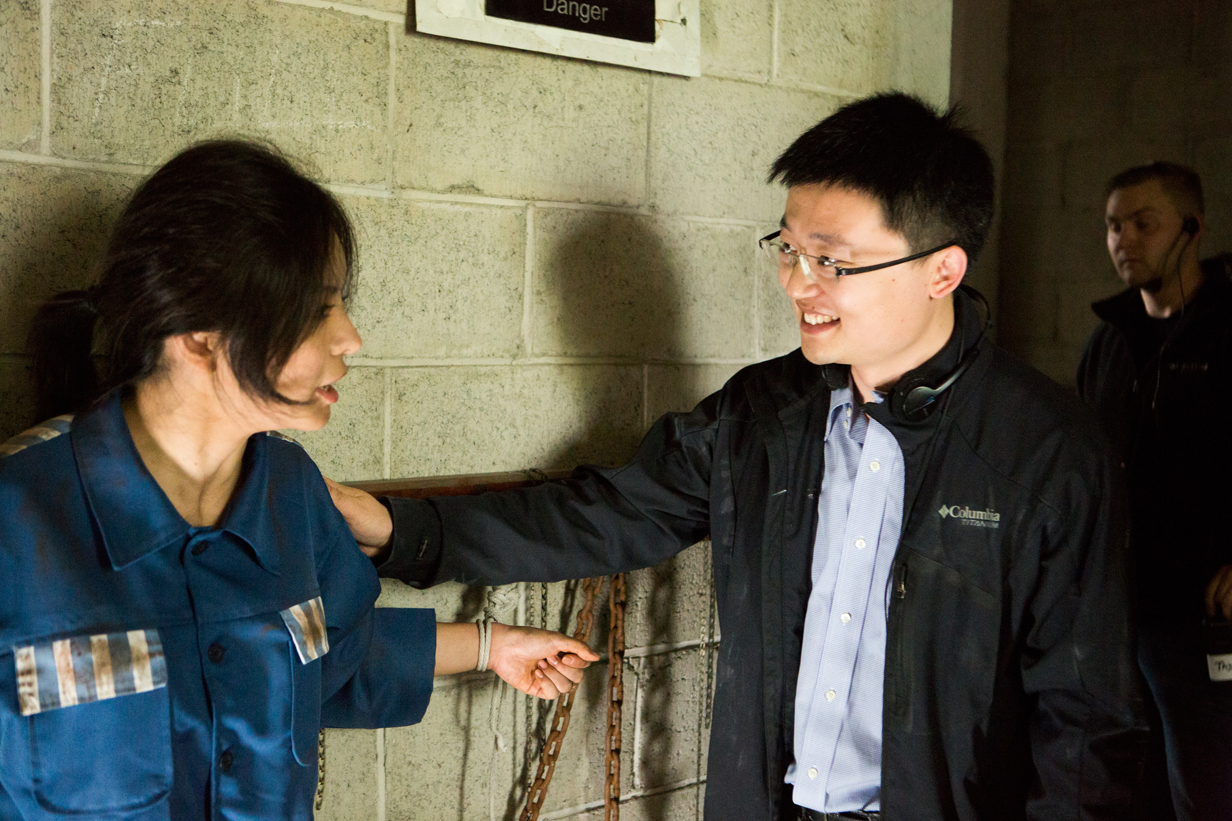 Director Leon Lee and actor Anastasia Lin on the set of 